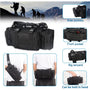 Black tactical bag with various compartments and features, set against a mountainous landscape.