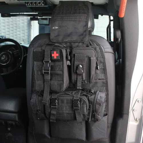Black tactical backpack on a car seat with a red cross symbol