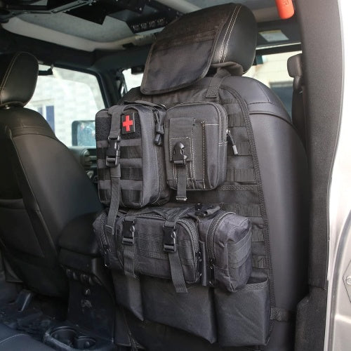 Tactical backpack with multiple pouches on a car seat